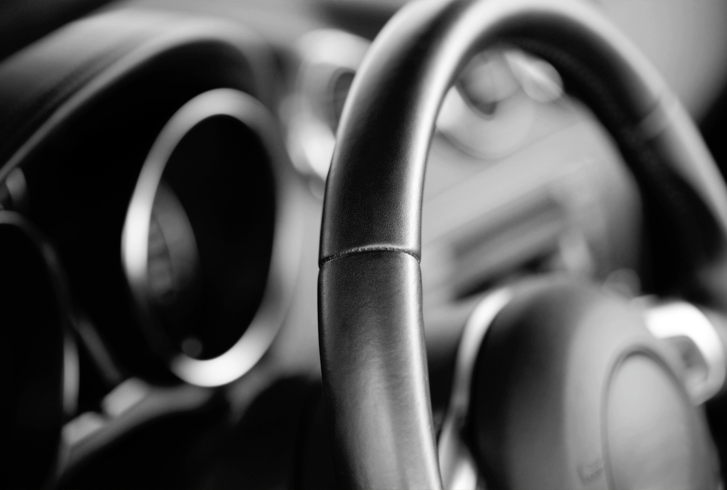 A closeup of a steering wheel