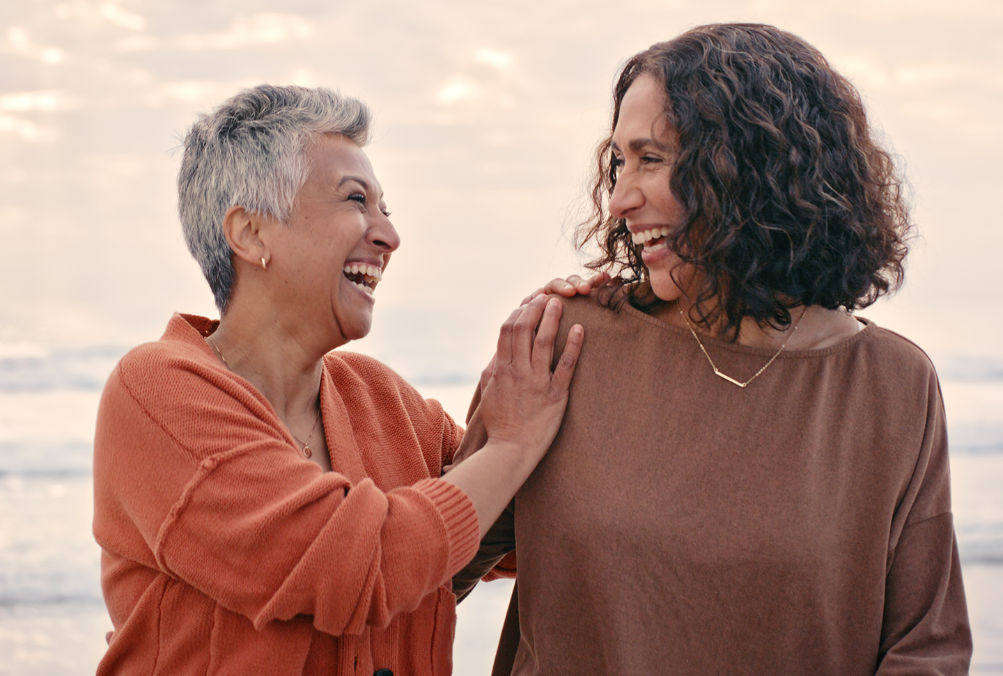 Two people smiling at each other